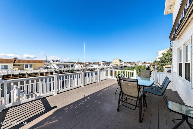 8 Mary Alice Rd, Beach Haven West, NJ 08050 - wooden terrace featuring a water view and outdoor dining area