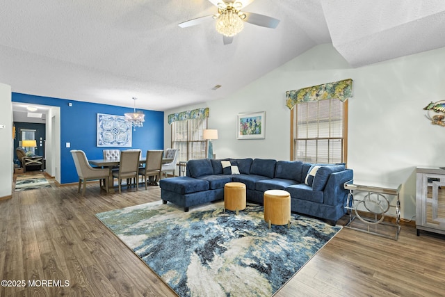 1887 Crimson Ct, Toms River, NJ 08755 - living room featuring a textured ceiling, a ceiling fan, wood finished floors, lofted ceiling, and plenty of natural light