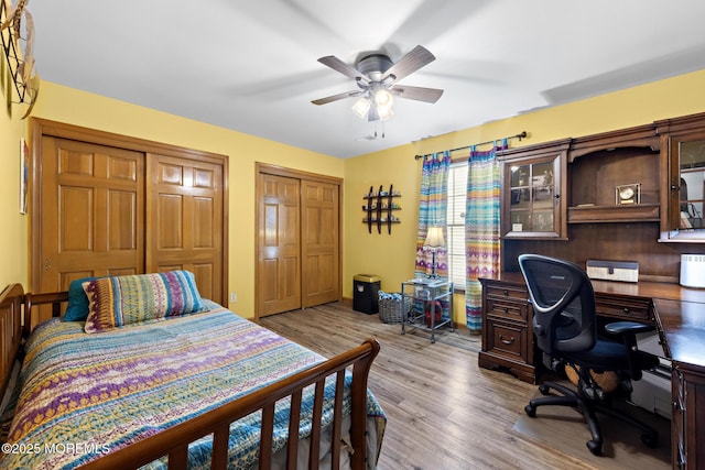 1887 Crimson Ct, Toms River, NJ 08755 - bedroom featuring multiple closets, an office area, wood finished floors, and a ceiling fan