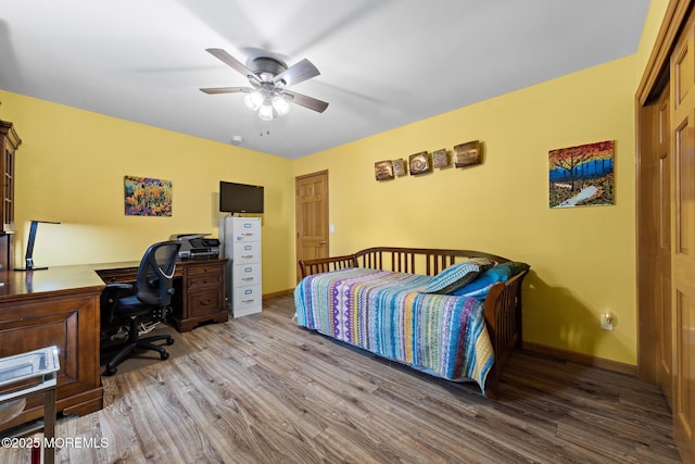 1887 Crimson Ct, Toms River, NJ 08755 - bedroom with wood finished floors, an office area, and a ceiling fan