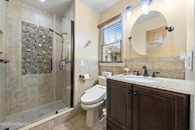 1887 Crimson Ct, Toms River, NJ 08755 - full bath with a shower stall, vanity, tile walls, a wainscoted wall, and tile patterned flooring