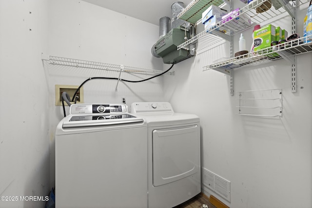 1887 Crimson Ct, Toms River, NJ 08755 - laundry area with washing machine and clothes dryer and wood finished floors