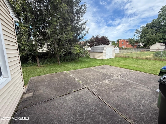 280 Mckinley Ave, Edison, NJ 08820 - fenced backyard with a patio and a storage unit