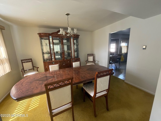 280 Mckinley Ave, Edison, NJ 08820 - carpeted dining room with a chandelier and baseboards