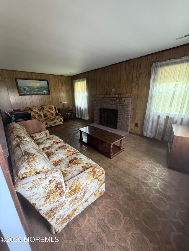 280 Mckinley Ave, Edison, NJ 08820 - living area featuring wood walls and a brick fireplace