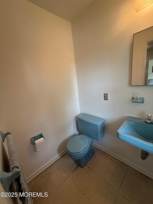 280 Mckinley Ave, Edison, NJ 08820 - half bath featuring toilet and tile patterned flooring