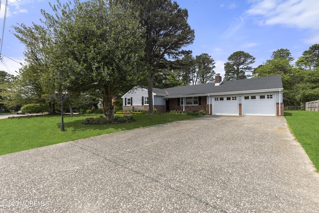 13 Pinehurst Dr, Little Egg Harbor, NJ 08087 - view of front of house featuring an attached garage, driveway, brick siding, and a front lawn