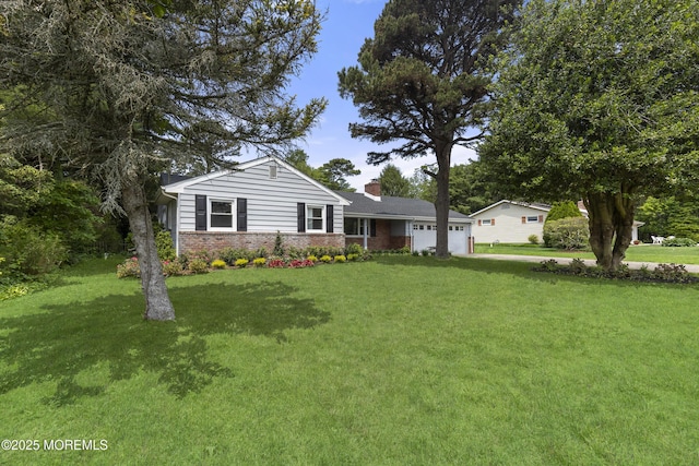 13 Pinehurst Dr, Little Egg Harbor, NJ 08087 - ranch-style home with a garage, brick siding, a chimney, and a front yard