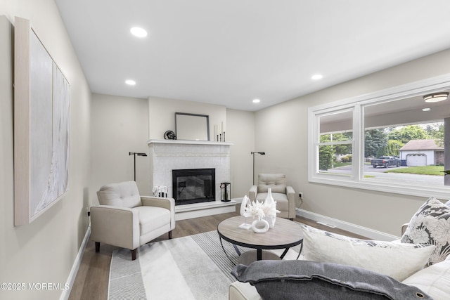 13 Pinehurst Dr, Little Egg Harbor, NJ 08087 - living room with a tile fireplace, wood finished floors, and recessed lighting