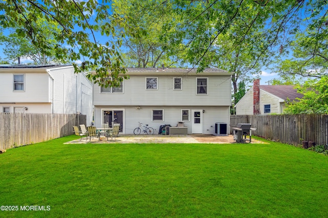 24 Roosevelt Dr, Brick, NJ 08724 - rear view of house with a patio and a fenced backyard