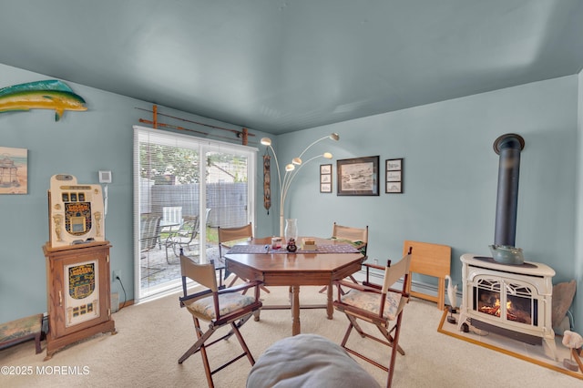 24 Roosevelt Dr, Brick, NJ 08724 - carpeted dining area with a wood stove
