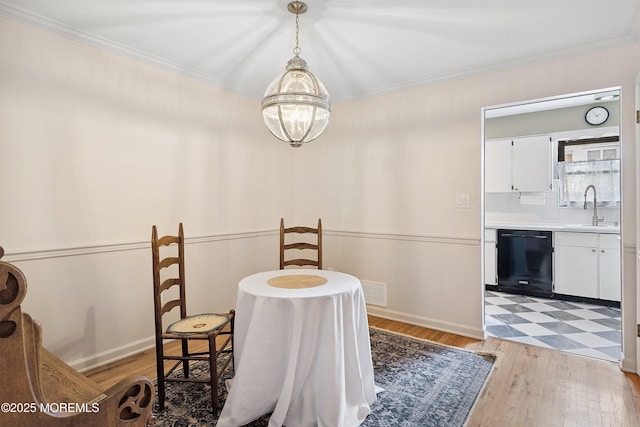 301 Spring St Unit 19, Red Bank, NJ 07701 - dining area featuring light wood-style flooring and crown molding
