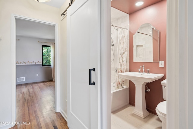 301 Spring St Unit 19, Red Bank, NJ 07701 - full bath with shower / tub combo with curtain and wood finished floors