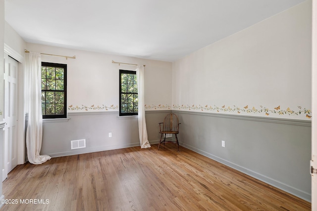 301 Spring St Unit 19, Red Bank, NJ 07701 - spare room featuring wood finished floors and baseboards
