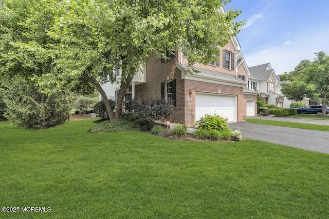 76 Deepwater Cir, Manalapan, NJ 07726 - view of side of property featuring brick siding, an attached garage, asphalt driveway, and a lawn