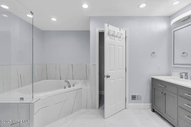 76 Deepwater Cir, Manalapan, NJ 07726 - full bathroom featuring marble look tile flooring, vanity, a garden tub, and recessed lighting