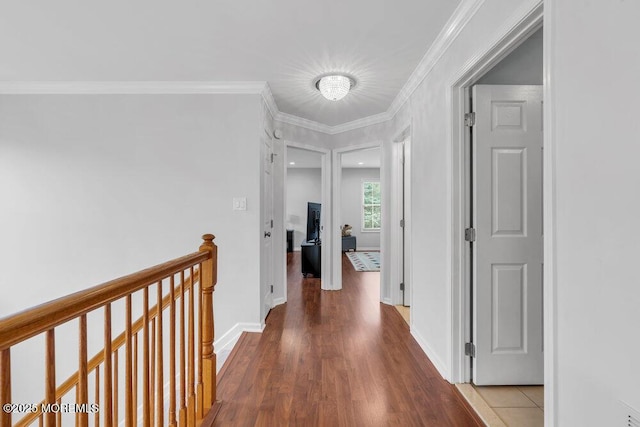 76 Deepwater Cir, Manalapan, NJ 07726 - hall with an upstairs landing, wood finished floors, and crown molding