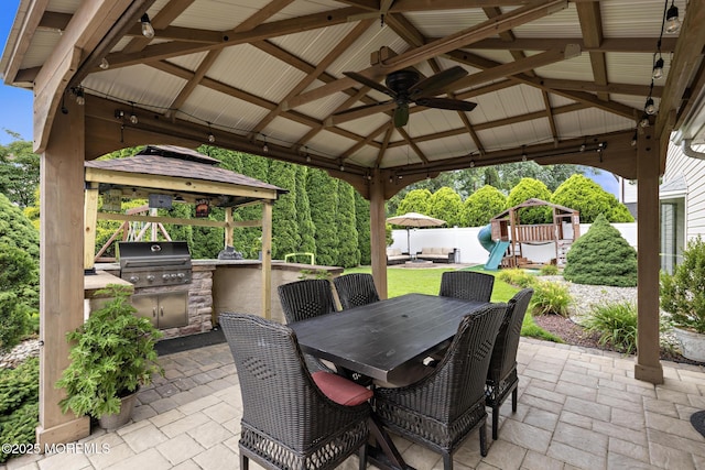 16 8th Ave, Monroe, NJ 08831 - fenced backyard with a gazebo, area for grilling, a patio, and outdoor dining area