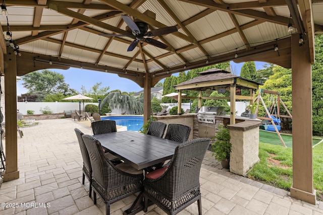 16 8th Ave, Monroe, NJ 08831 - view of patio with a gazebo, outdoor dining area, an outdoor kitchen, and a ceiling fan