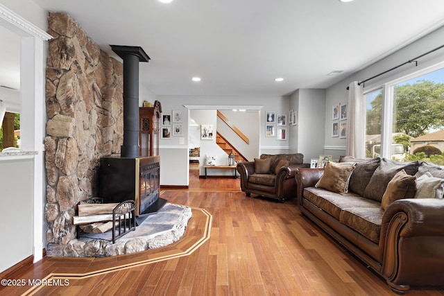 16 8th Ave, Monroe, NJ 08831 - living room featuring a wood stove, light wood-style floors, stairway, and recessed lighting