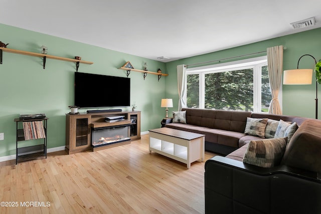 180 Grand Ave, Atlantic Highlands, NJ 07716 - living room featuring wood finished floors and baseboards