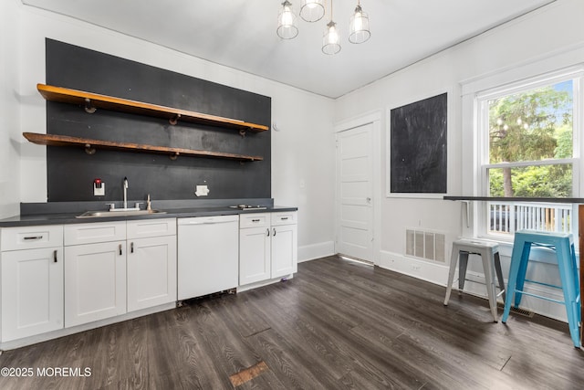 405 Hope Chapel Rd, Lakewood, NJ 08701 - indoor wet bar featuring dishwasher, dark wood-style flooring, and decorative light fixtures
