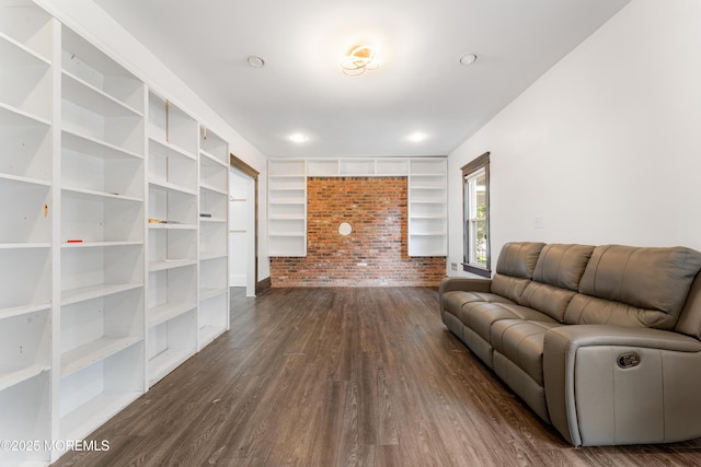 405 Hope Chapel Rd, Lakewood, NJ 08701 - living room with brick wall and dark wood-type flooring