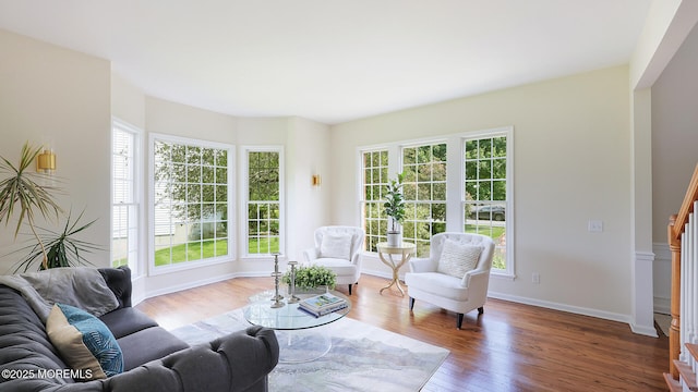 18 Sage St, Holmdel, NJ 07733 - living area featuring wood finished floors and stairway