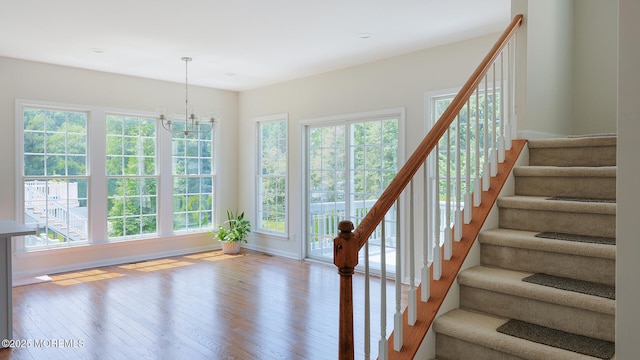 18 Sage St, Holmdel, NJ 07733 - staircase with hardwood / wood-style flooring, a chandelier, and recessed lighting