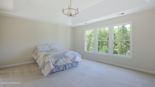 18 Sage St, Holmdel, NJ 07733 - bedroom with a chandelier, light carpet, and a tray ceiling