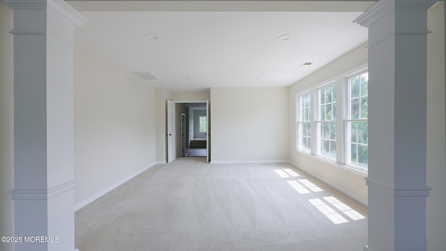 18 Sage St, Holmdel, NJ 07733 - spare room with light carpet and decorative columns