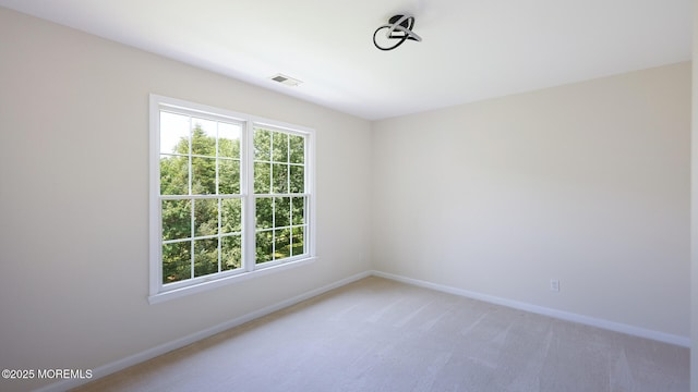 18 Sage St, Holmdel, NJ 07733 - empty room with baseboards and light carpet