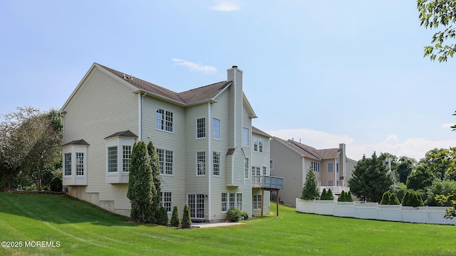 18 Sage St, Holmdel, NJ 07733 - rear view of property featuring a chimney