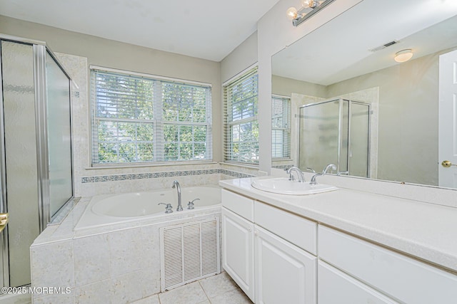 9 Mioduski Ct, Parlin, NJ 08859 - full bath with plenty of natural light, a garden tub, a stall shower, and vanity