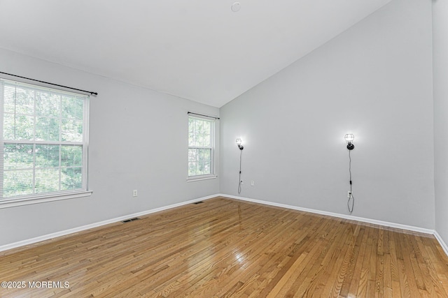 9 Mioduski Ct, Parlin, NJ 08859 - unfurnished room featuring light wood-type flooring and vaulted ceiling