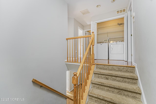 9 Mioduski Ct, Parlin, NJ 08859 - staircase with washing machine and clothes dryer and wood finished floors