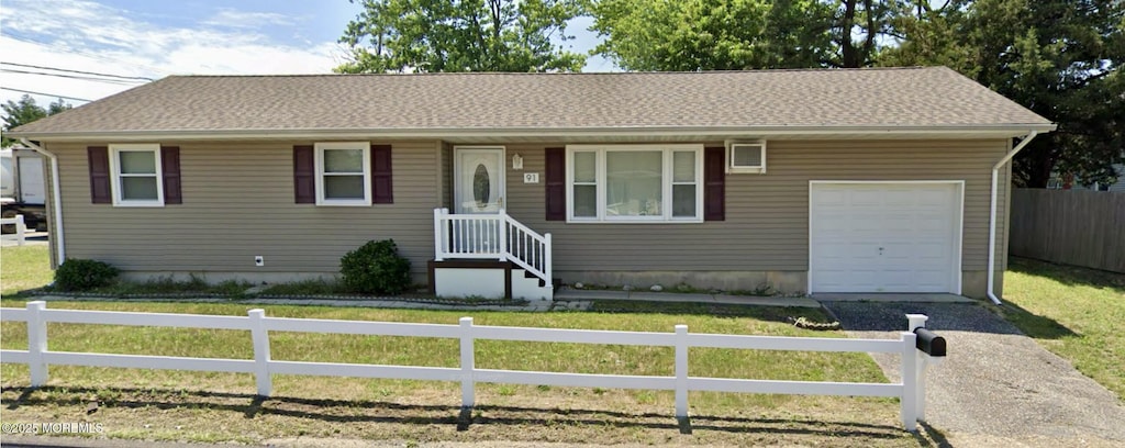 91 Birch St, Beachwood, NJ 08722 - single story home featuring a garage and asphalt driveway
