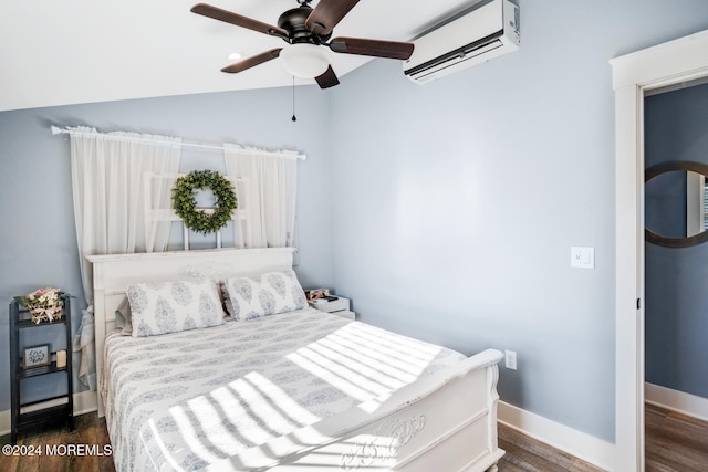 401 Kingfisher Rd, Tuckerton, NJ 08087 - bedroom with a wall mounted air conditioner, dark wood-style floors, vaulted ceiling, and ceiling fan