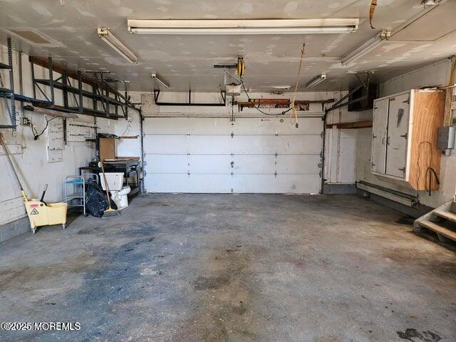 19 Sunrise Blvd, Forked River, NJ 08731 - garage featuring a garage door opener