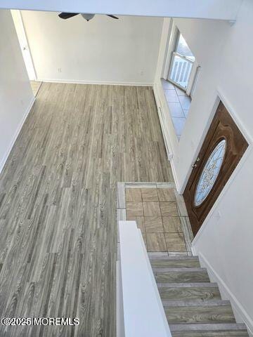 19 Sunrise Blvd, Forked River, NJ 08731 - stairway with a ceiling fan and wood finished floors