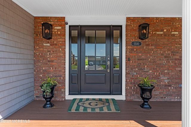 1510 Bel Aire Ct E, Point Pleasant, NJ 08742 - view of exterior entry with covered porch and brick siding