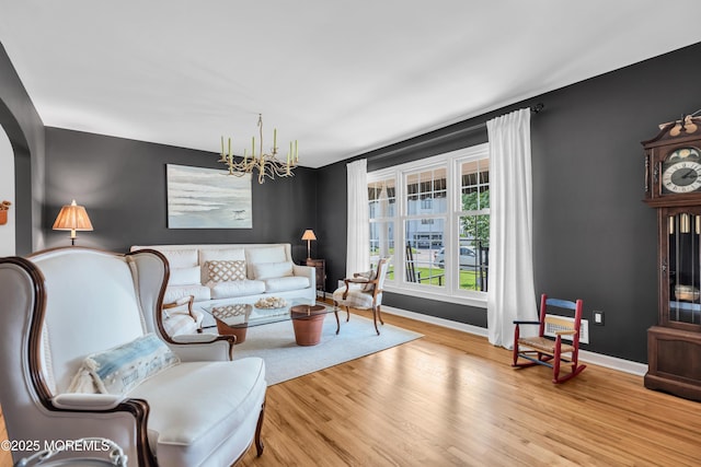 1510 Bel Aire Ct E, Point Pleasant, NJ 08742 - living area featuring a chandelier and wood finished floors