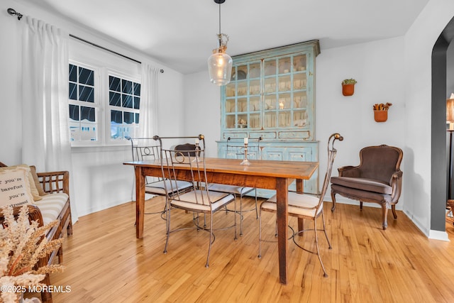 1510 Bel Aire Ct E, Point Pleasant, NJ 08742 - dining space with arched walkways and light wood-style floors