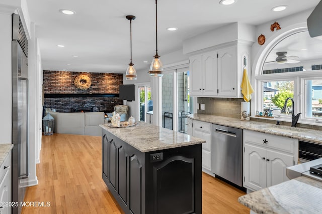 1510 Bel Aire Ct E, Point Pleasant, NJ 08742 - kitchen with stainless steel appliances, a kitchen island, white cabinets, ceiling fan, and recessed lighting