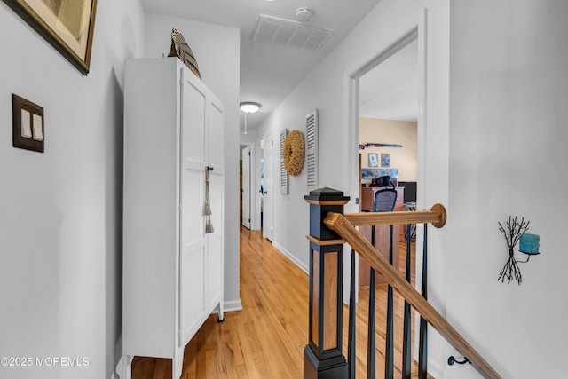 1510 Bel Aire Ct E, Point Pleasant, NJ 08742 - hallway with an upstairs landing and light wood-style floors