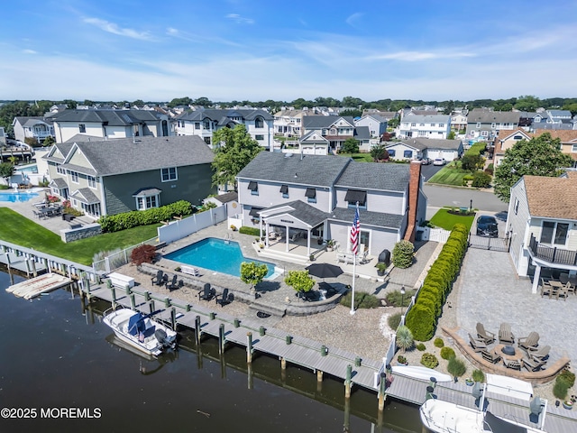 1510 Bel Aire Ct E, Point Pleasant, NJ 08742 - aerial perspective of suburban area featuring a pool and a large body of water