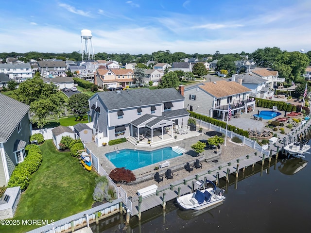 1510 Bel Aire Ct E, Point Pleasant, NJ 08742 - aerial perspective of suburban area with a pool area and a large body of water