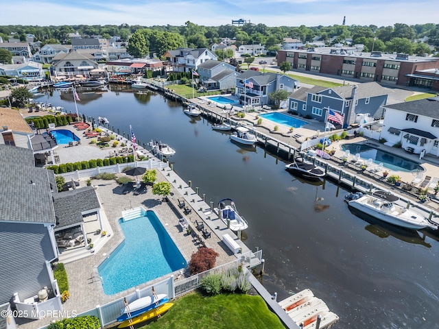 1510 Bel Aire Ct E, Point Pleasant, NJ 08742 - aerial perspective of suburban area with a large body of water and a pool area
