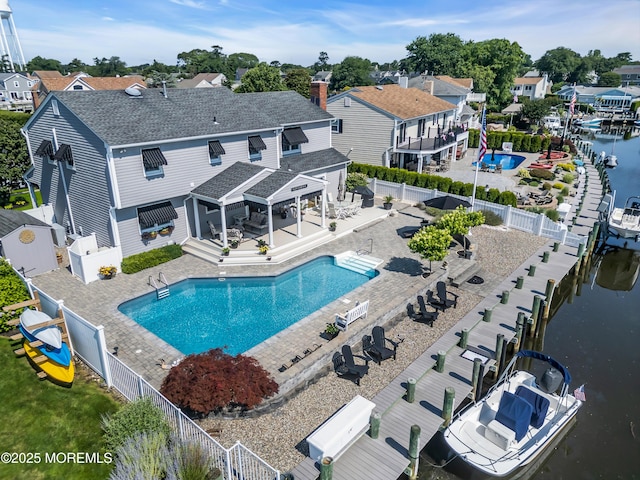 1510 Bel Aire Ct E, Point Pleasant, NJ 08742 - community pool with a fenced backyard, a residential view, a water view, and a patio area