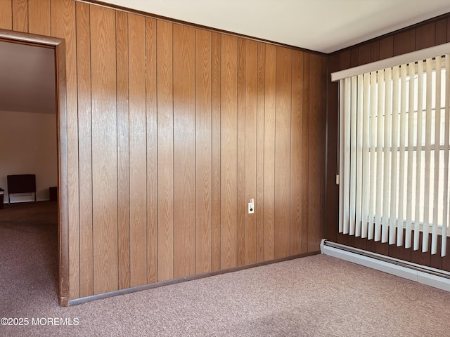 458 Jamaica Blvd, Toms River, NJ 08757 - empty room with a baseboard radiator, carpet flooring, and wood walls